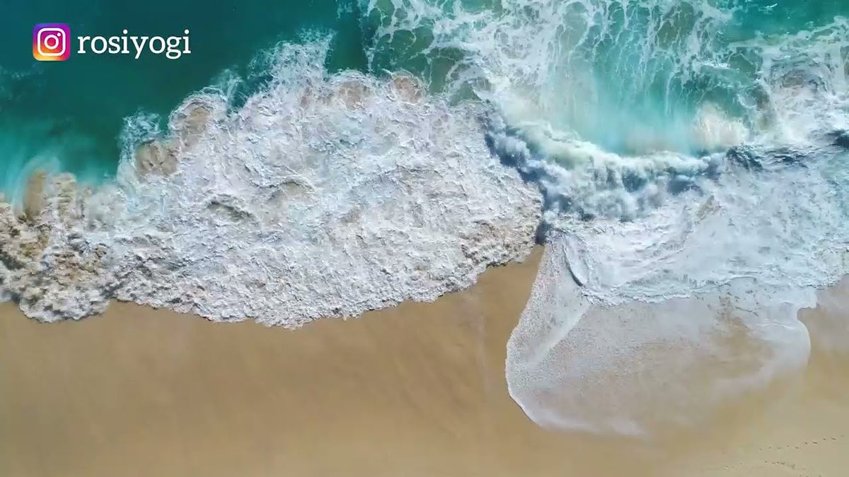 Waves on a beach, seen from above