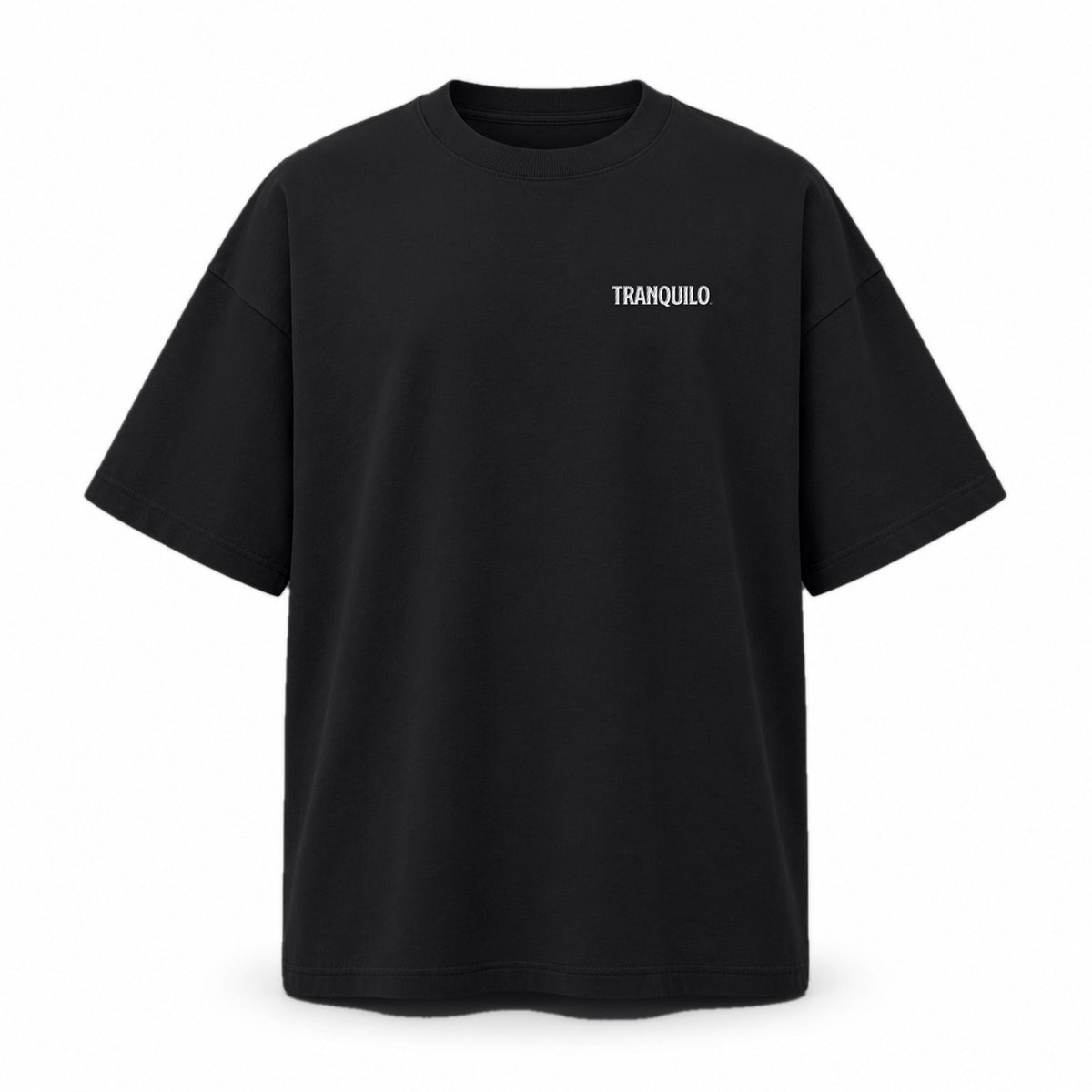 Black T-shirt with a small TRANQUILO embroidered in white on the chest