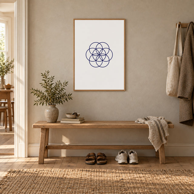 Poster Bloom, white, in an oak frame above a hallway bench