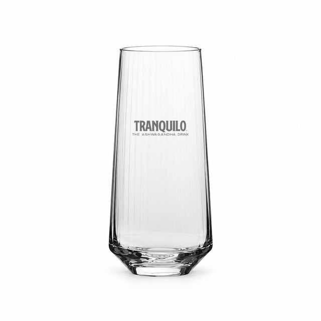 Highball glass with fine vertical ribs, engraved with the Tranquilo logo